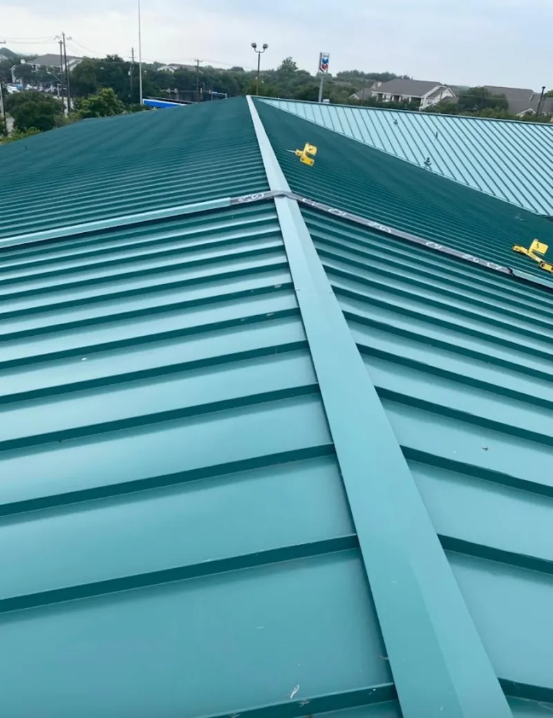 Green commercial metal roof ridge and valley for Metal Roof Repair in Montvale