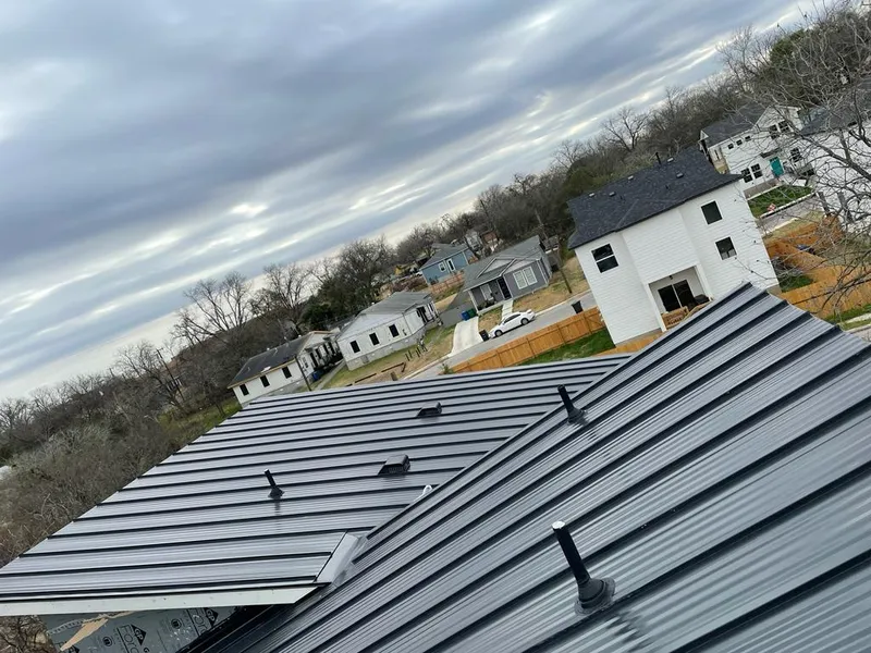 Standing seam metal roof panels with vents for Skylight Repair in Montvale